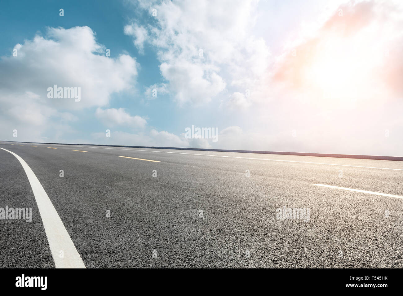 Empty asphalt road ground and blue sky with white clouds scene Stock ...