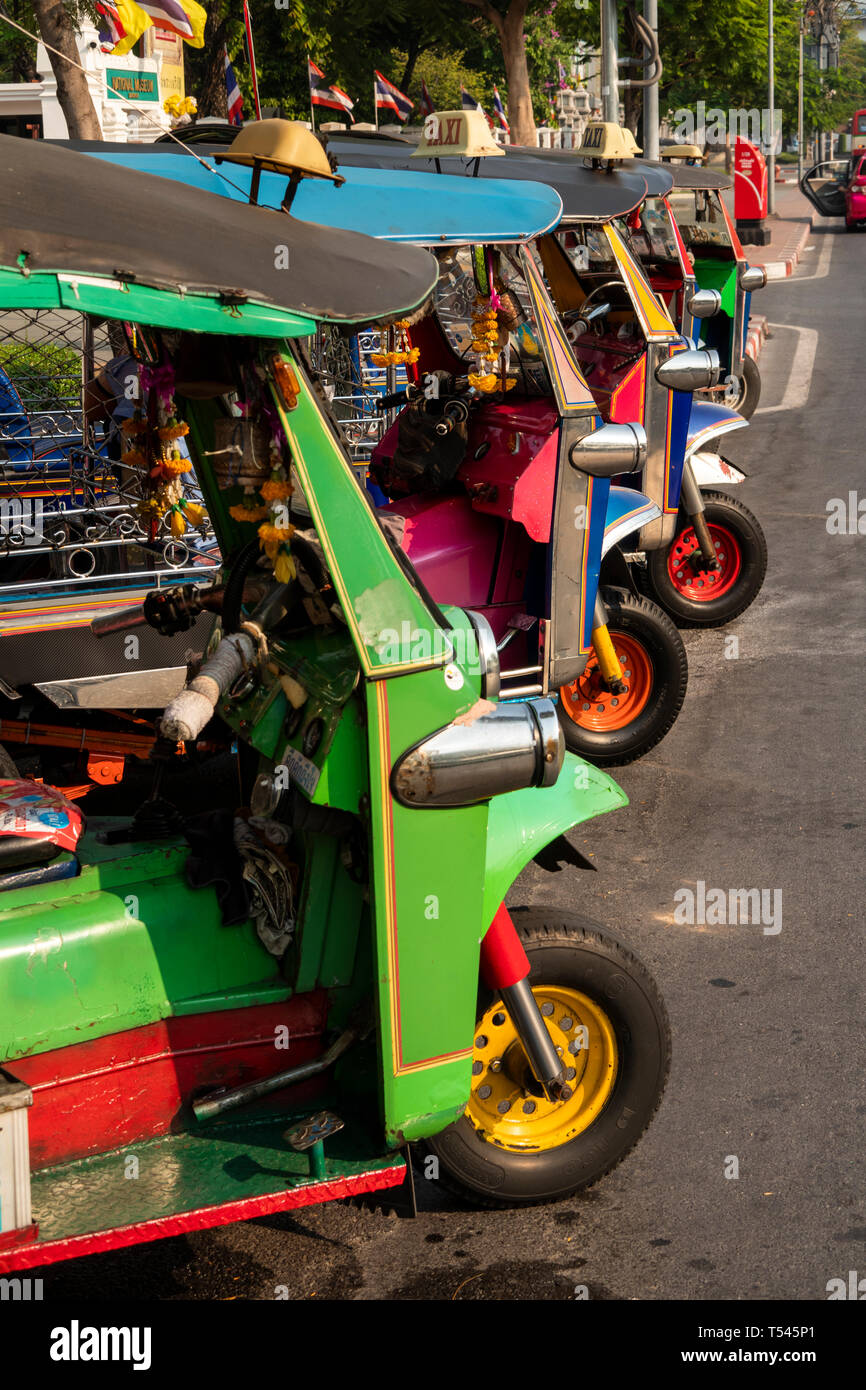Thailand, Bangkok, Na Phra That Alley, line of tuk tuk auto rickshaws outside National Museum Stock Photo