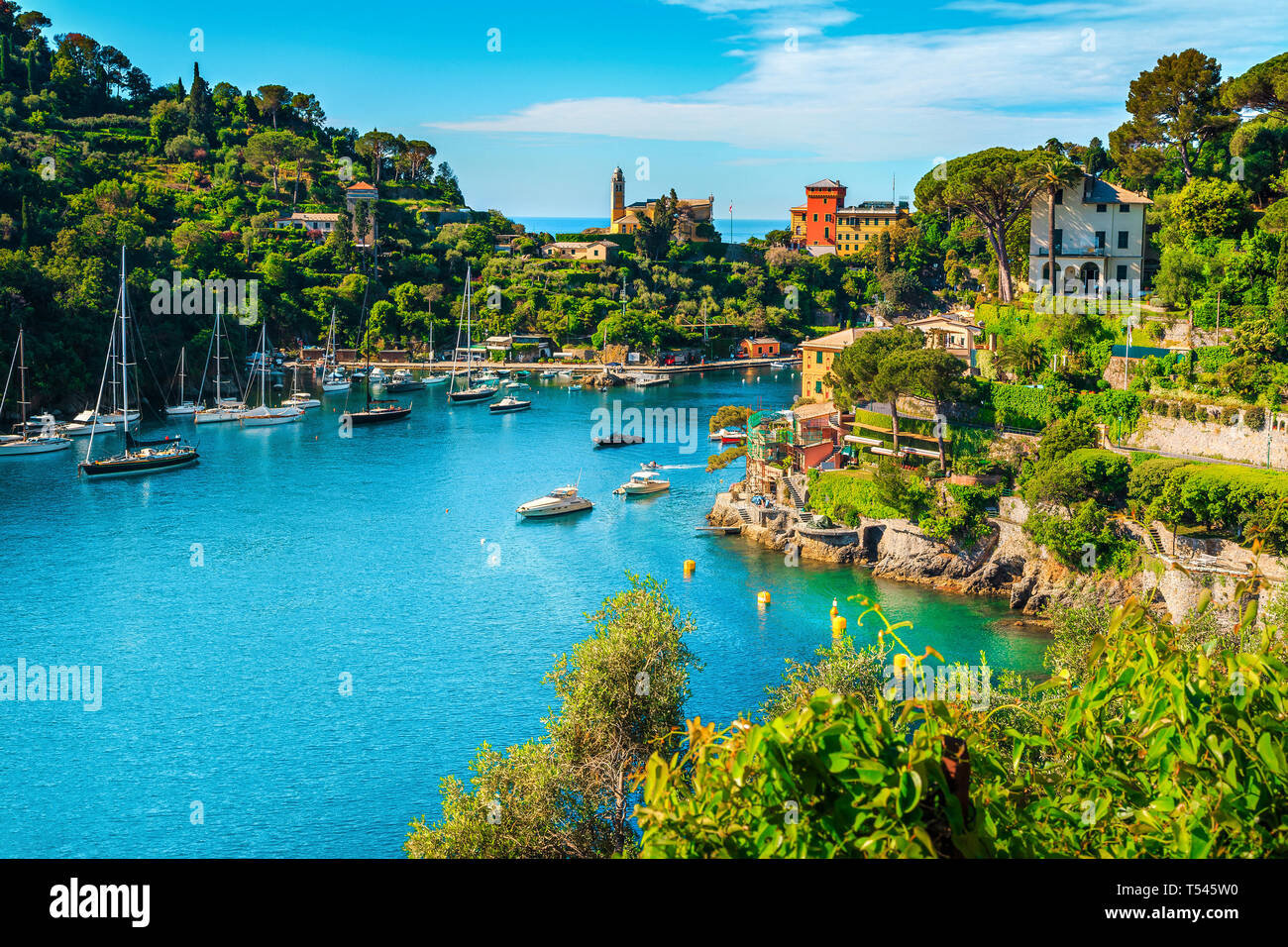 Wonderful bay with colorful mediterranean buildings and boats, yachts in spectacular vacation resort, Portofino, Liguria, Italy, Europe Stock Photo