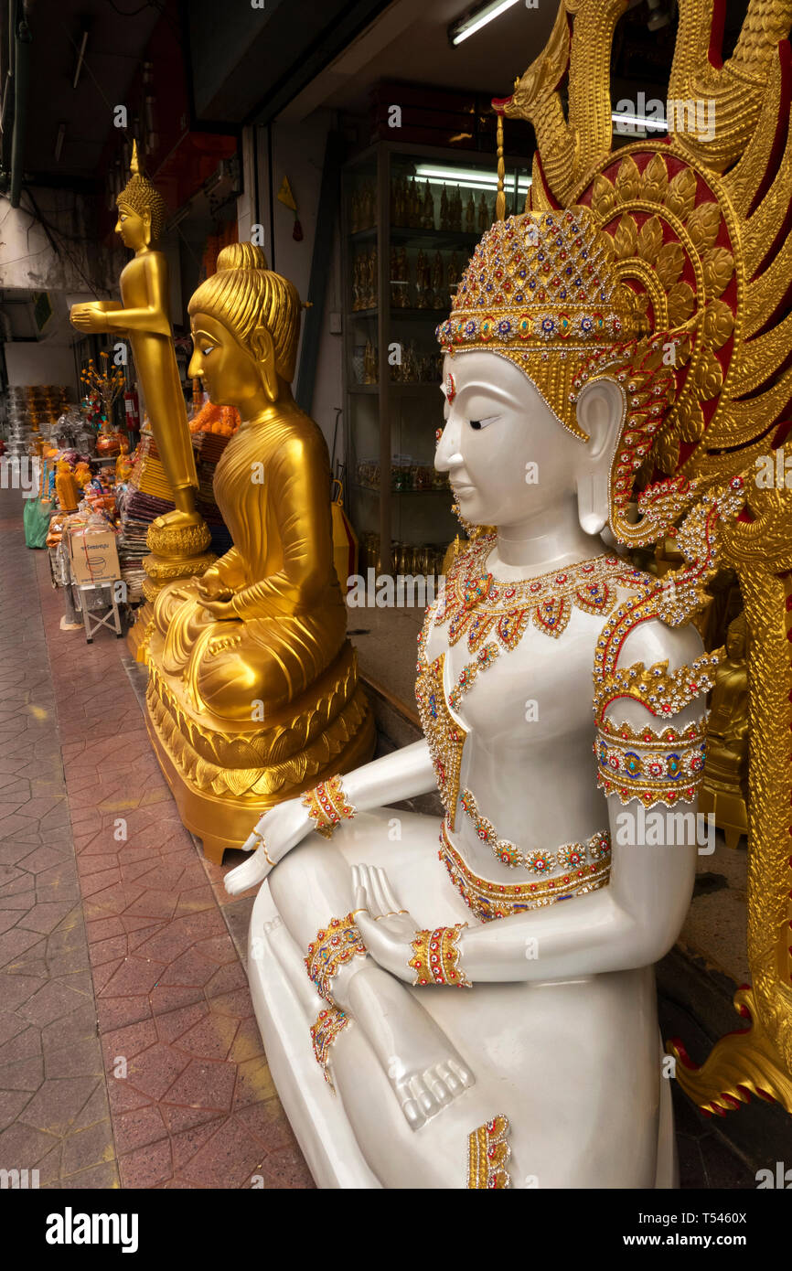 Thailand, Bangkok, Thanon Bamrung Mueang, Soi Mahannop2, Buddhist Supplies Shop, large ornately decorated white and golden buddhas for sale Stock Photo