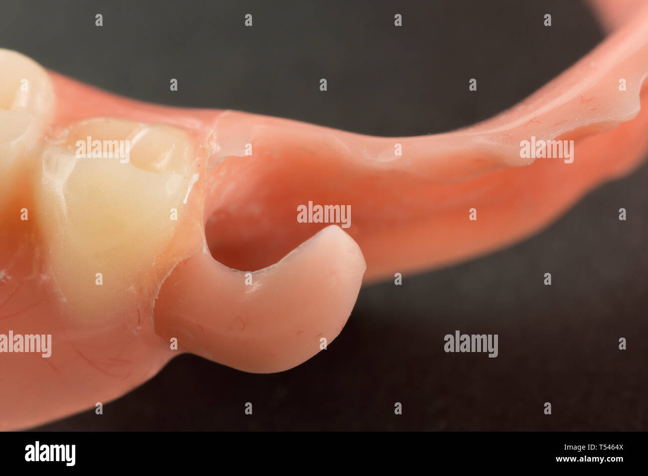 large image of a modern nylon denture on a black background Stock Photo