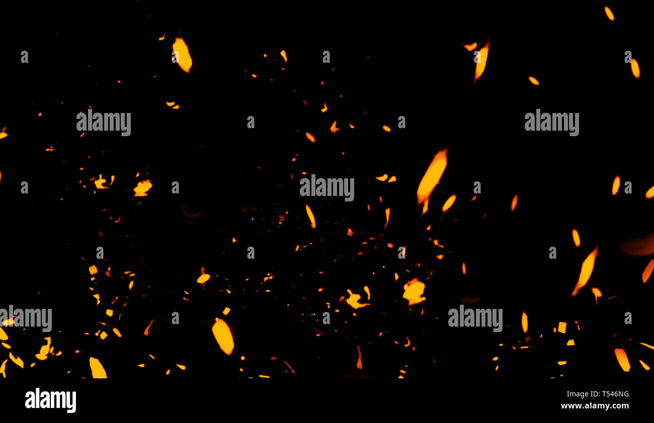 Fire particles effect dust debris isolated on black background, motion ...