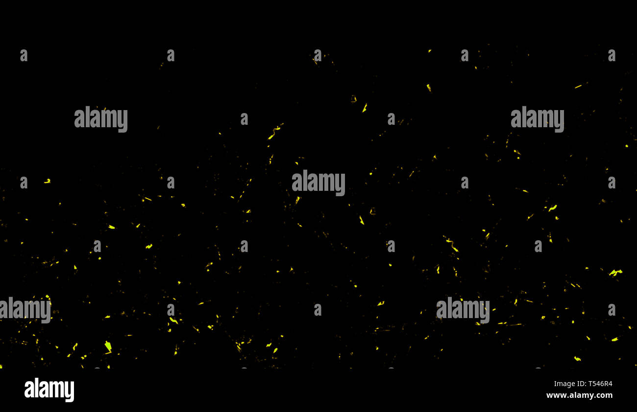 Yellow particles effect dust debris isolated on black background, motion powder spray. Stock Photo