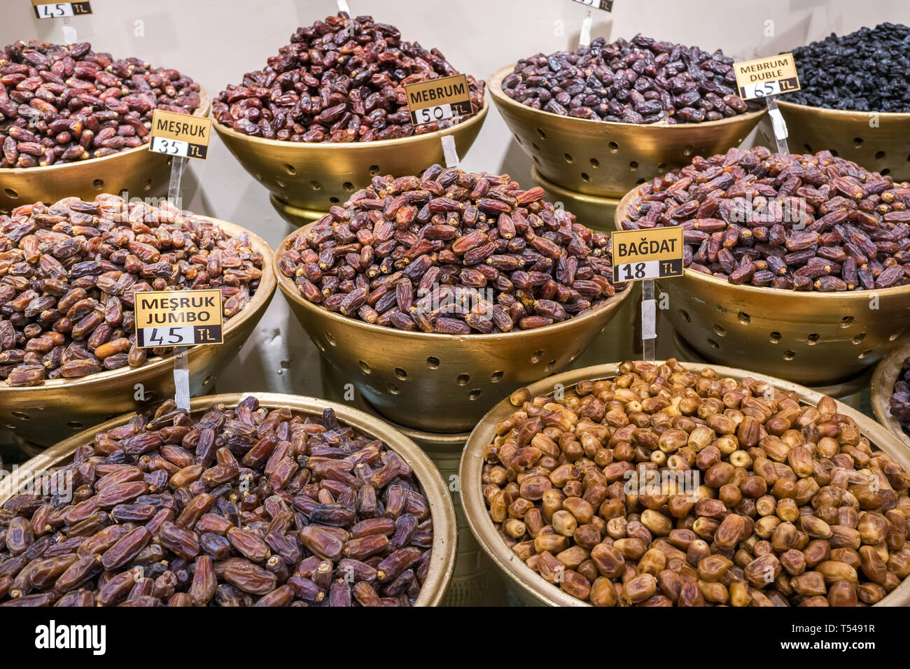 Various types of dried dates for sale  in the shop in Turkey Stock Photo