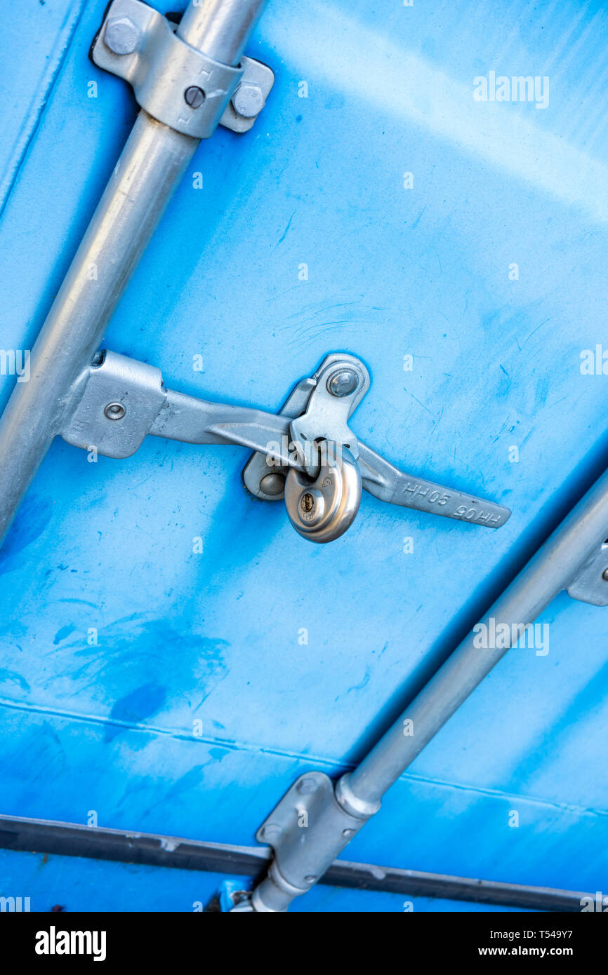 Steel door secured with padlock Stock Photo