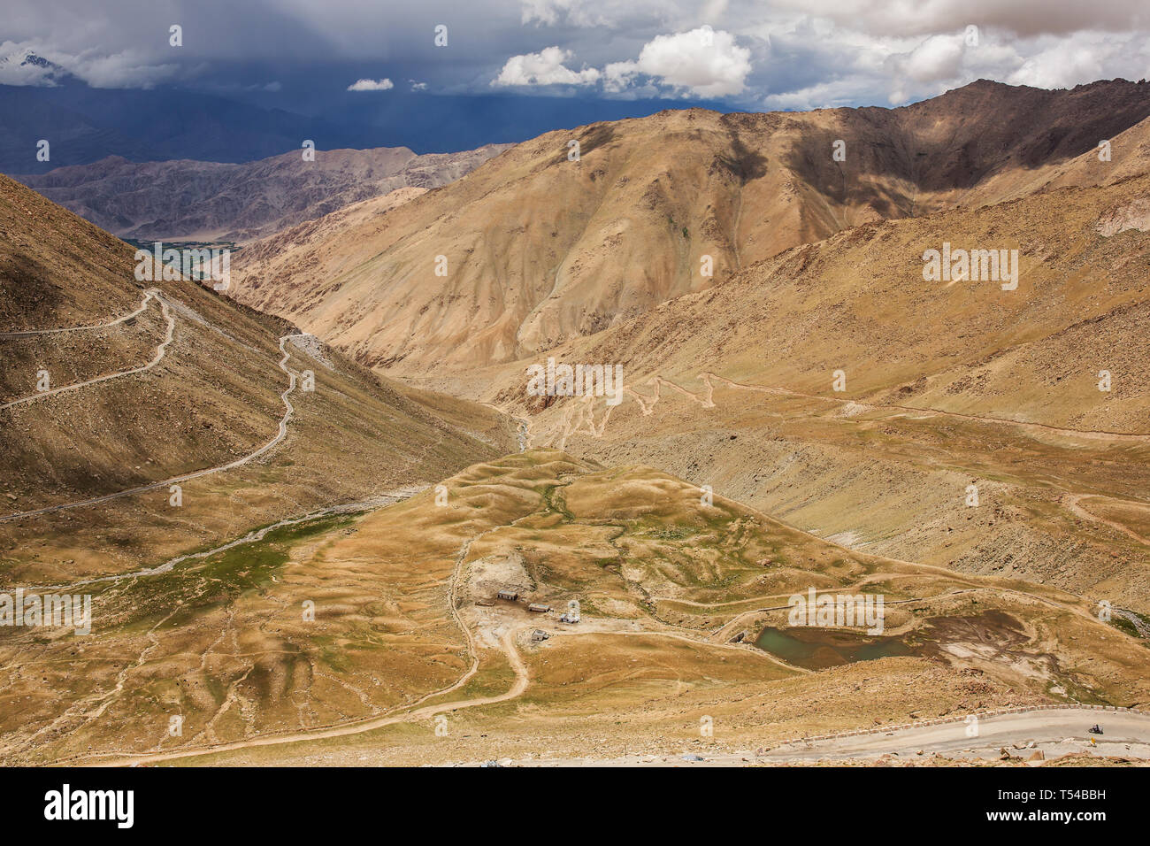 Mountain road climbing up to the pass in Himalaya mountains, Ladakh region, India Stock Photo