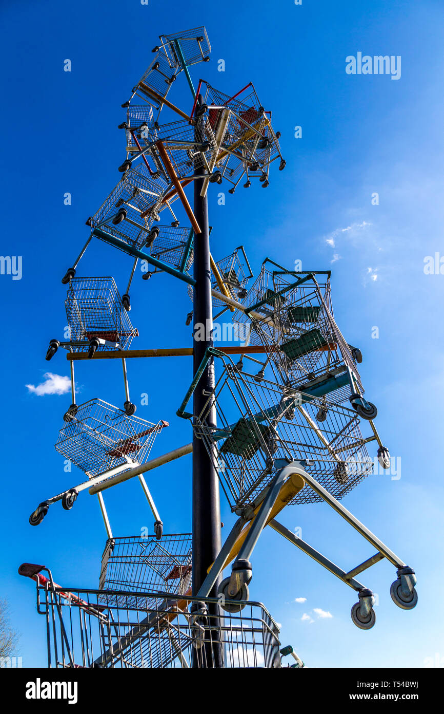 DNA DL90 (2003) by Abigail Fallis, sculpture made of shopping trolleys, as part of The Line Sculpture Walk in London, UK Stock Photo