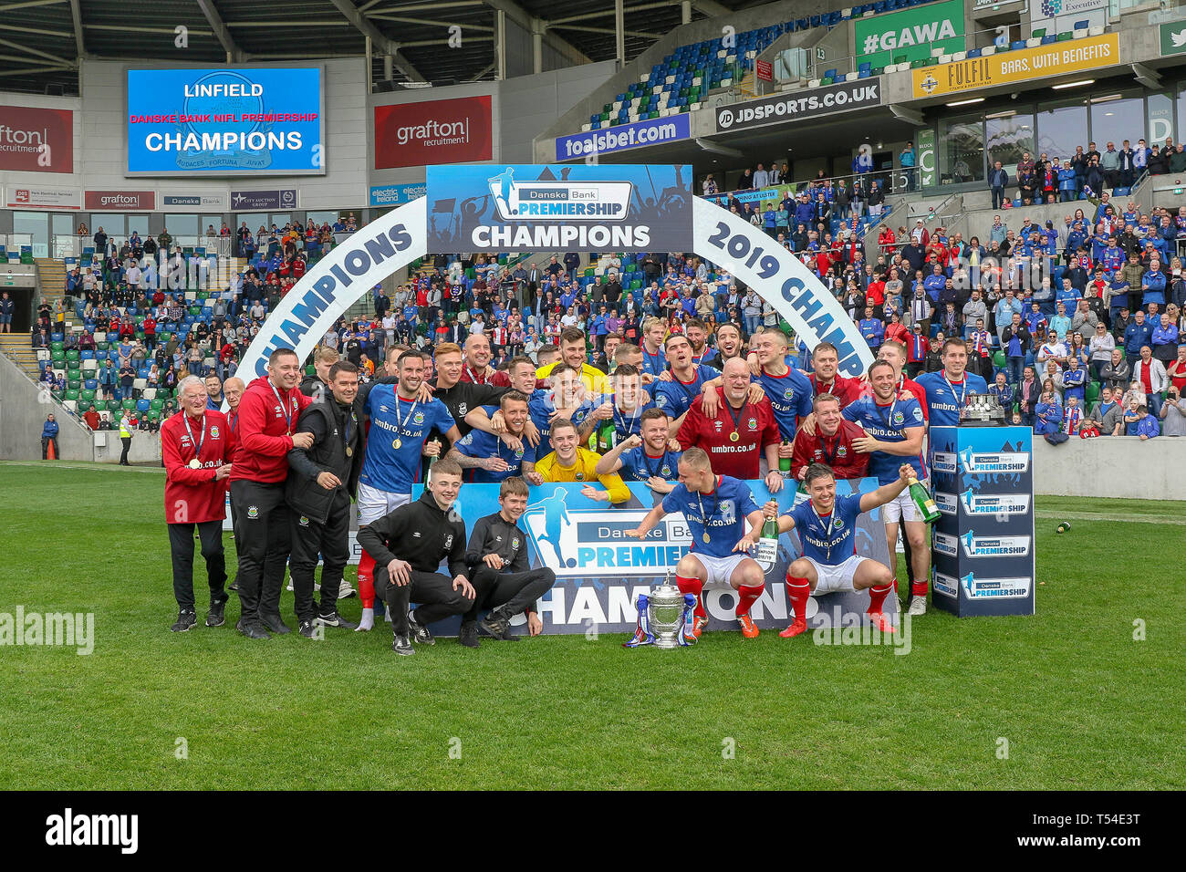 Windsor Park, Belfast, Northern Ireland, UK. 20th Apr, 2019. Linfield, confirmed as Danske Bank Premiership champions last Saturday, lifted the league trophy today after their home league game against Glenavon. The Belfast side, managed by former Northern Ireland international David Healy, have now won the Irish League title on 53 occasions. Linfield with the cup. Credit: CAZIMB/Alamy Live News. Stock Photo