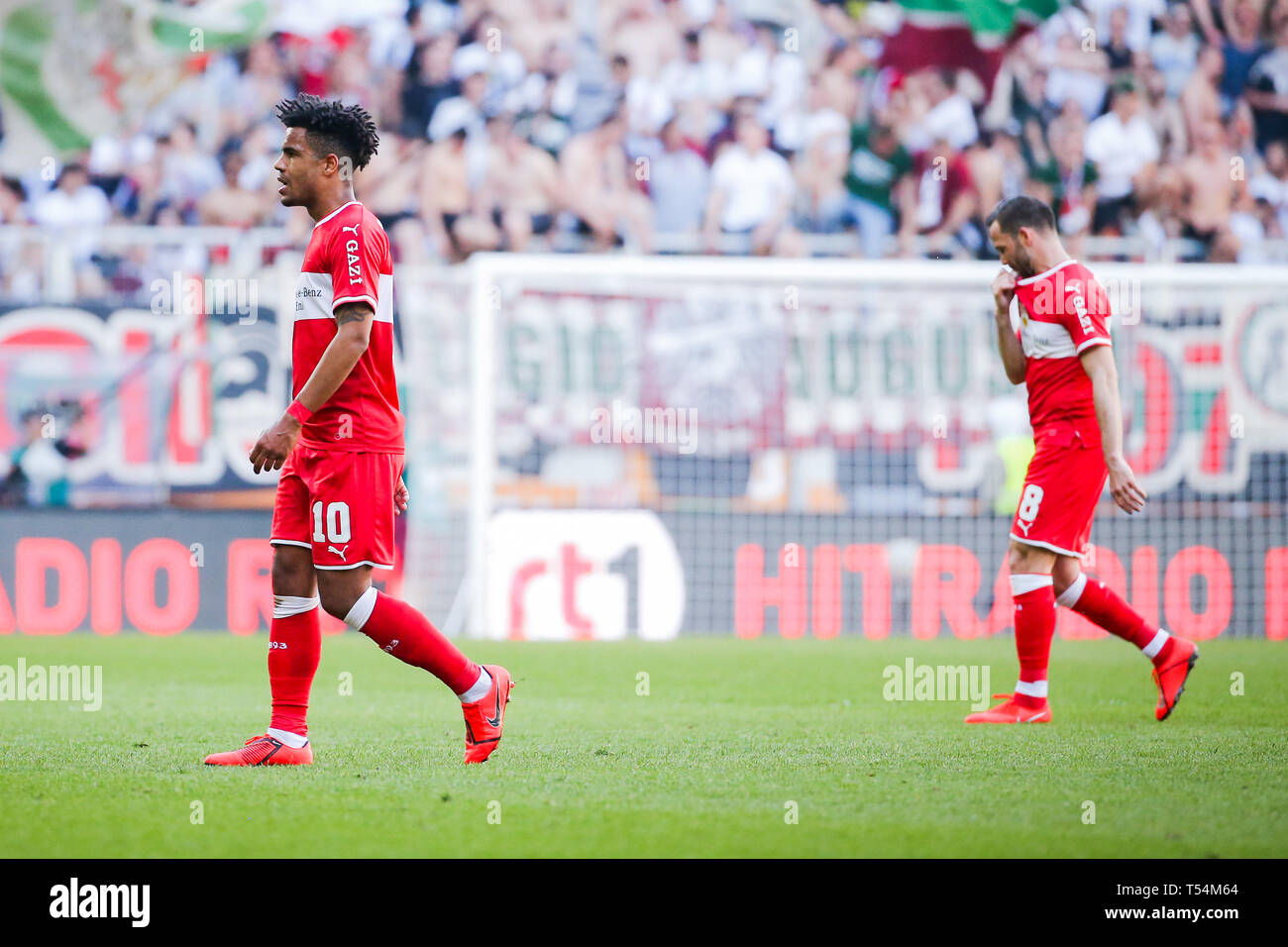 Augsburg, Germany. 20th Apr, 2019. Soccer: Bundesliga, FC Augsburg - VfB Stuttgart 30th matchday in the WWK-Arena. Stuttgart's Daniel Didavi (l) and Gonzalo Castro are unhappy on the court. Credit: Tom Weller/dpa - IMPORTANT NOTE: In accordance with the requirements of the DFL Deutsche Fußball Liga or the DFB Deutscher Fußball-Bund, it is prohibited to use or have used photographs taken in the stadium and/or the match in the form of sequence images and/or video-like photo sequences./dpa/Alamy Live News Stock Photo