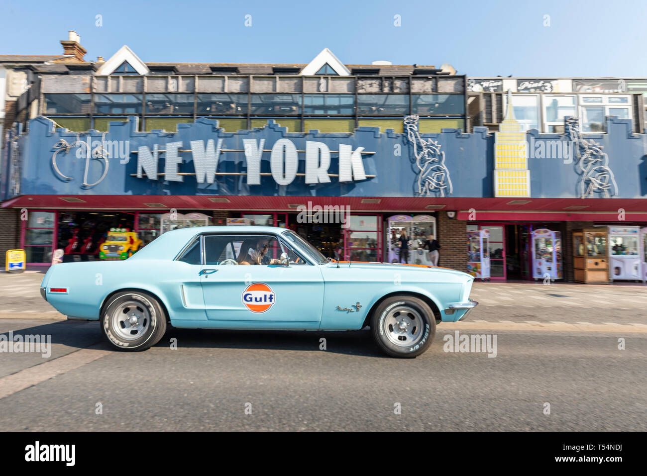 Classic car show taking place along the seafront at Marine Parade, Southend on Sea, Essex, UK. Ford Mustang in Gulf racing colours, colors Stock Photo