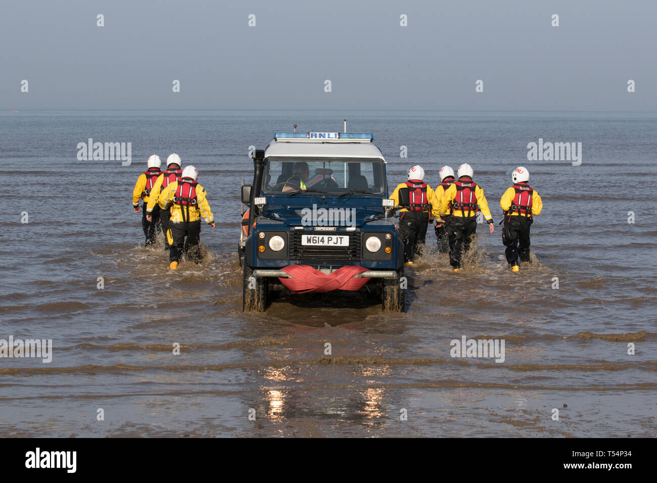 Land Rover rescue crew & boat launch in Blackpool, Lancashire. 21st April, 2019. UK Weather.  Lifeguards and lifeboat crew join forces, training exercises in the Irish Sea. Stock Photo