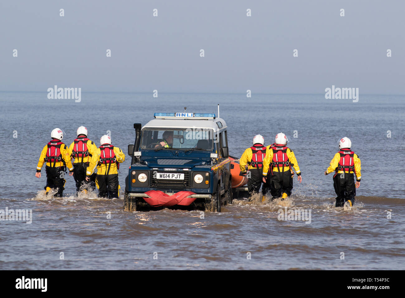 LifeGuard off-road beach & trail patrol rescue vehicle Land Rover rescue crew & boat launch in Blackpool, Lancashire. 21st April, 2019. UK Weather.  Lifeguards and lifeboat crew join forces, training exercises in the Irish Sea. Stock Photo
