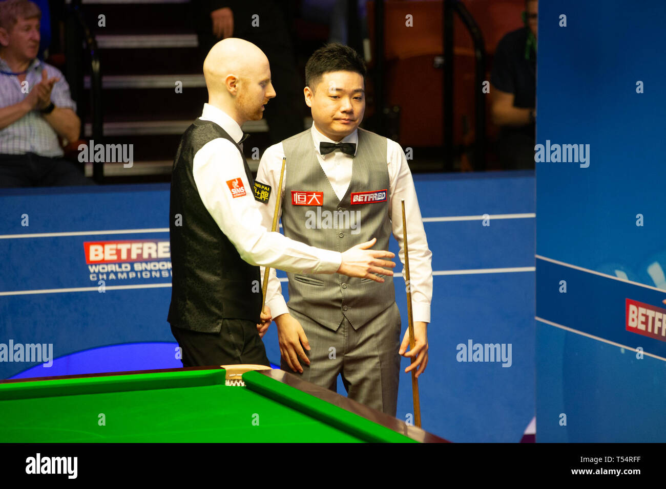 Sheffield, UK. 21st Apr 2019. Ding Junhui plays against Anthony McGill and wins (19 frames 7:10 respectively) at the Betfred World Snooker Championship at the Crucible Theatre in Sheffield, 2019 Credit: Myles Wright/ZUMA Wire/Alamy Live News Stock Photo