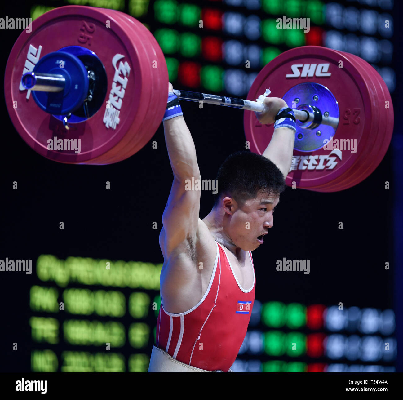 Ningbo, China's Zhejiang Province. 21st Apr, 2019. Pak Jong Ju of the Democratic People's Republic of Korea competes during the men's weightlifting 67kg event at the Asian Weightlifting Championships in Ningbo, east China's Zhejiang Province, April 21, 2019. Pak Jong Ju won the bronze with 322 points in total. Credit: Huang Zongzhi/Xinhua/Alamy Live News Stock Photo