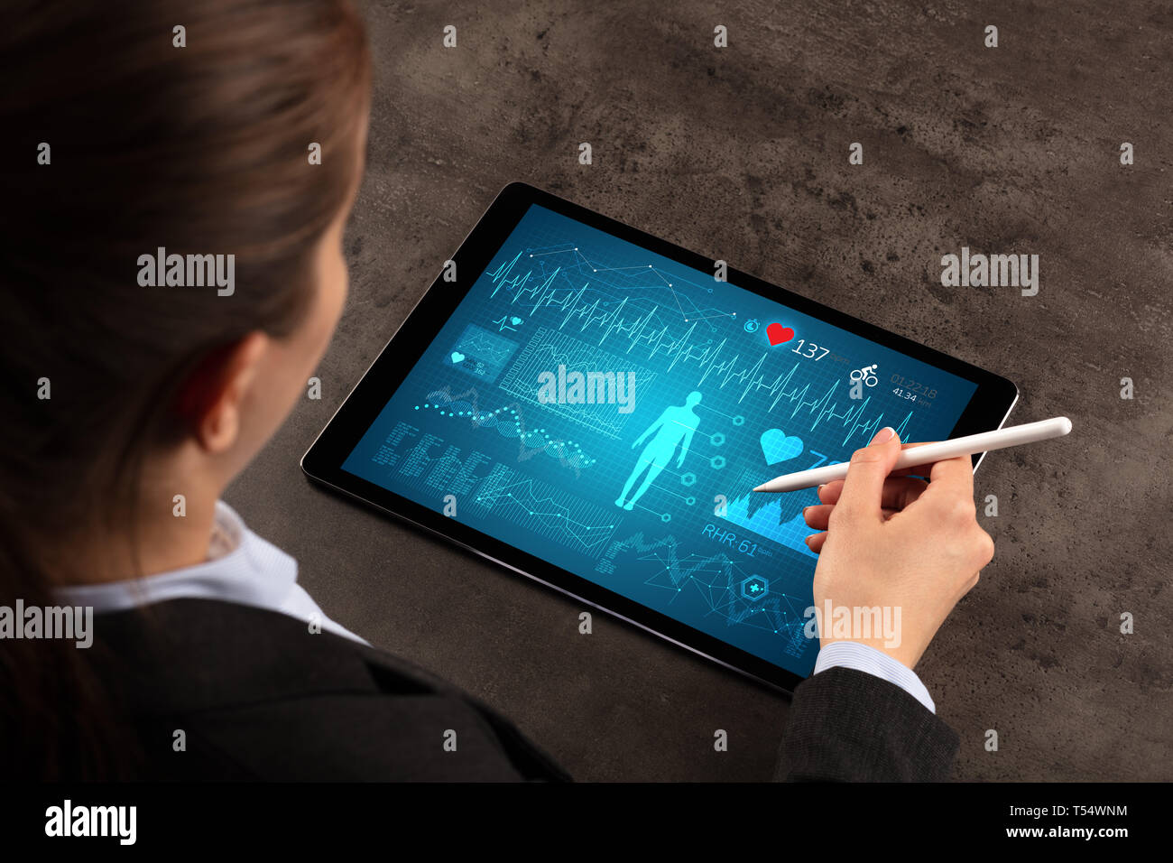 Business woman making healthy analysis on tablet  Stock Photo