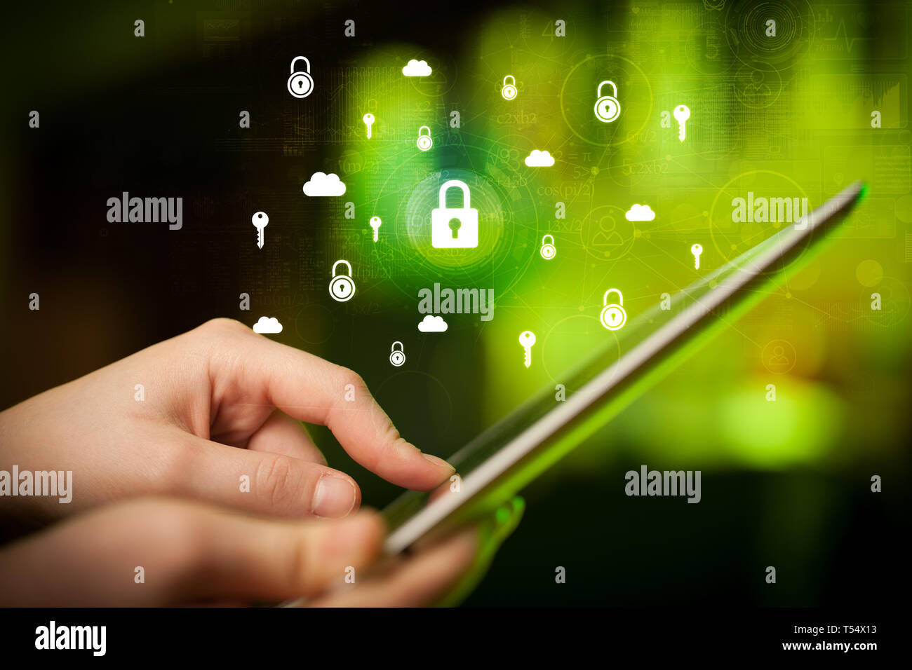 Hand holding tablet with online security system concept Stock Photo - Alamy