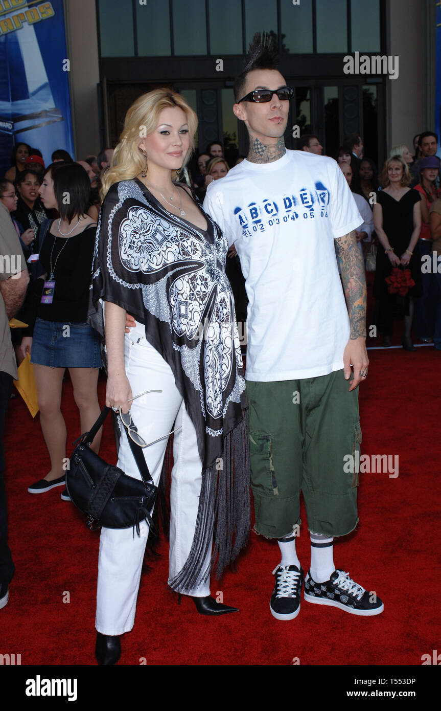 LOS ANGELES, CA. November 22, 2005: Blink 182 star TRAVIS BARKER & wife actress SHANNA MOAKLER at the 2005 American Music Awards in Los Angeles. © Paul Smith / Featureflash Stock Photo