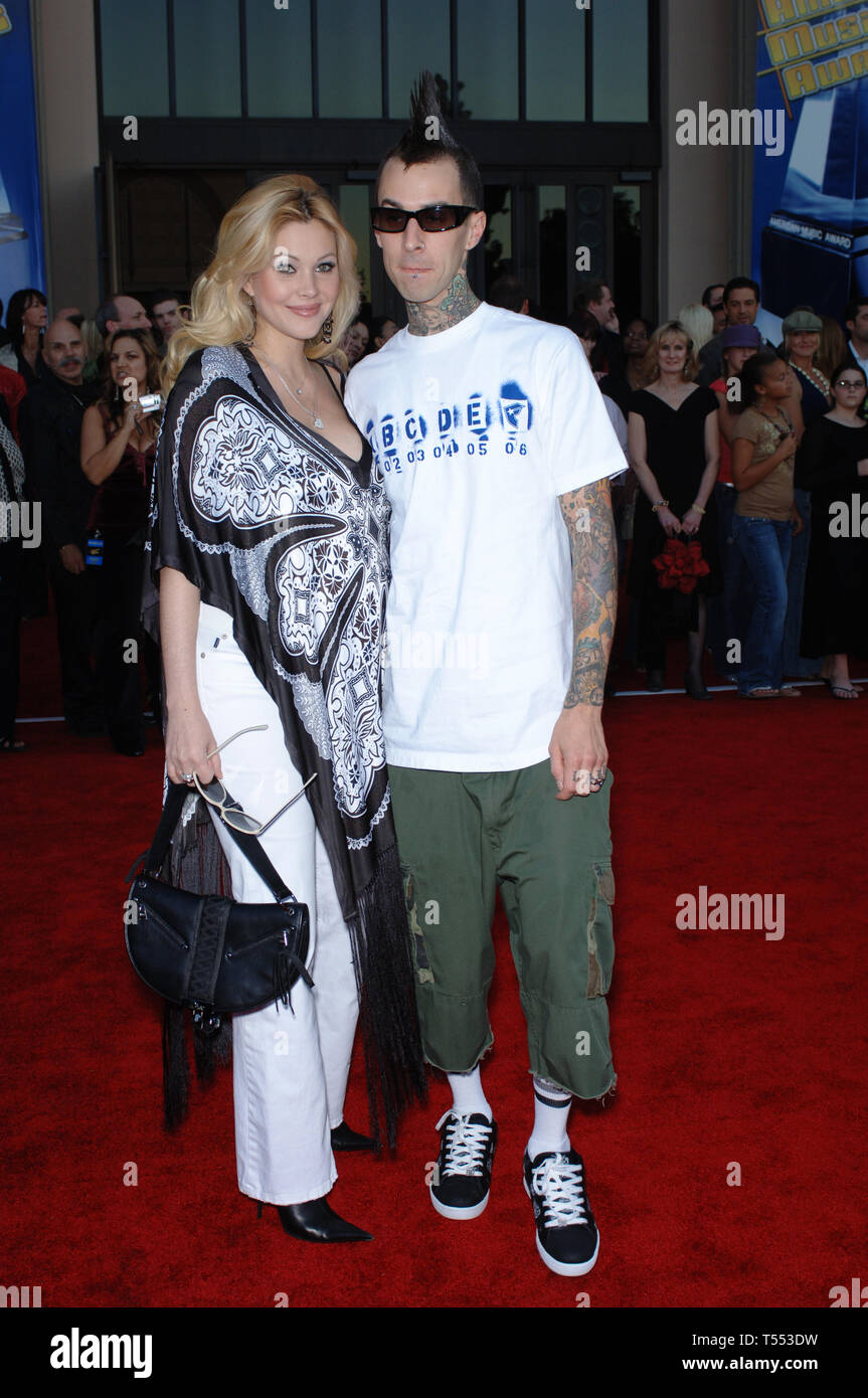 LOS ANGELES, CA. November 22, 2005: Blink 182 star TRAVIS BARKER & wife actress SHANNA MOAKLER at the 2005 American Music Awards in Los Angeles. © Paul Smith / Featureflash Stock Photo