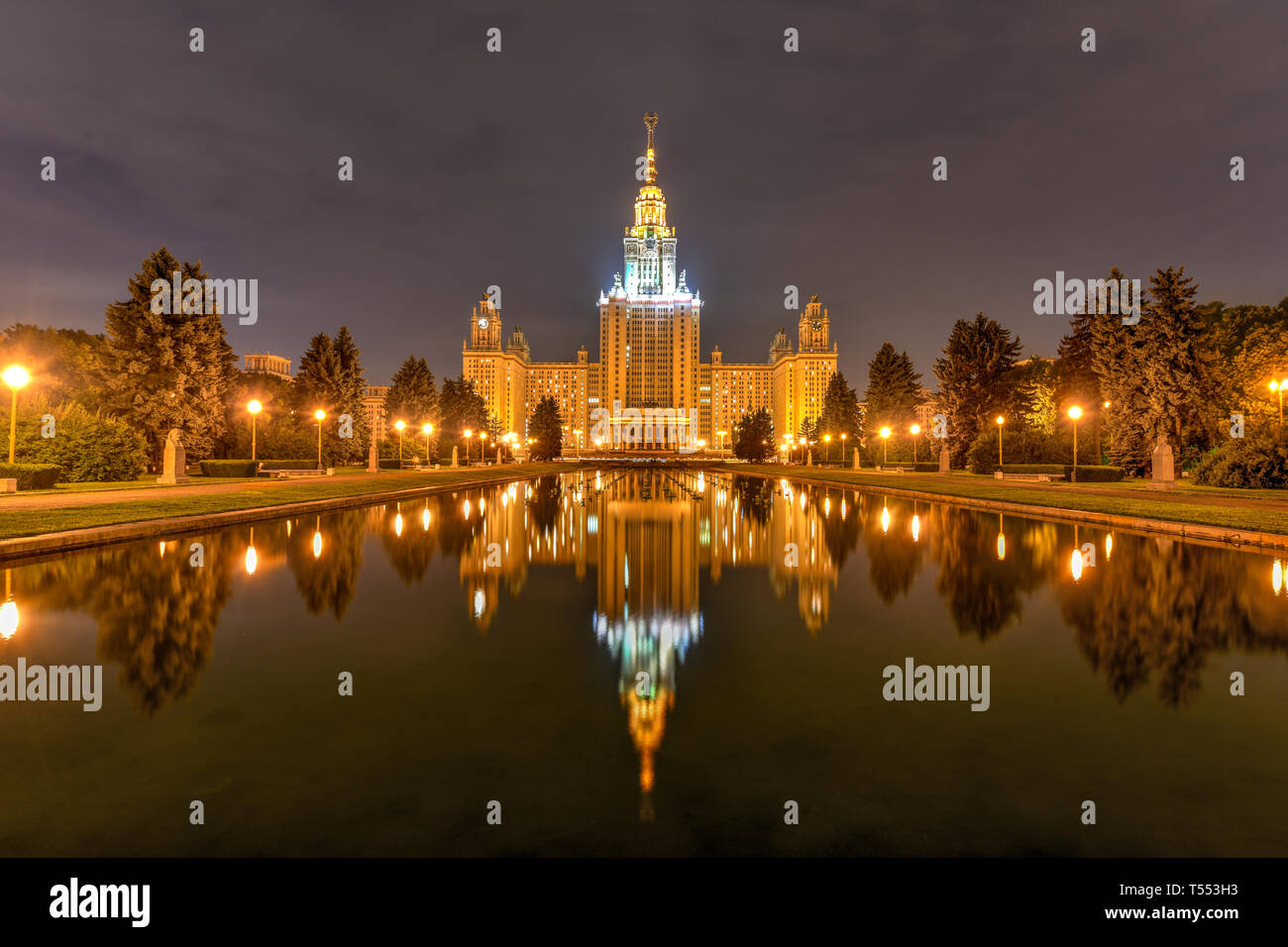 Night view of the Moscow State University in Russia. Moscow State University is a coeducational and public research university located in Moscow, Russ Stock Photo