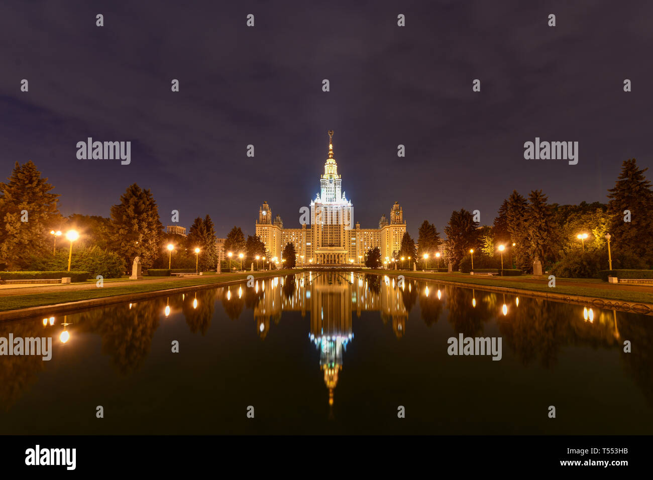 Night view of the Moscow State University in Russia. Moscow State University is a coeducational and public research university located in Moscow, Russ Stock Photo
