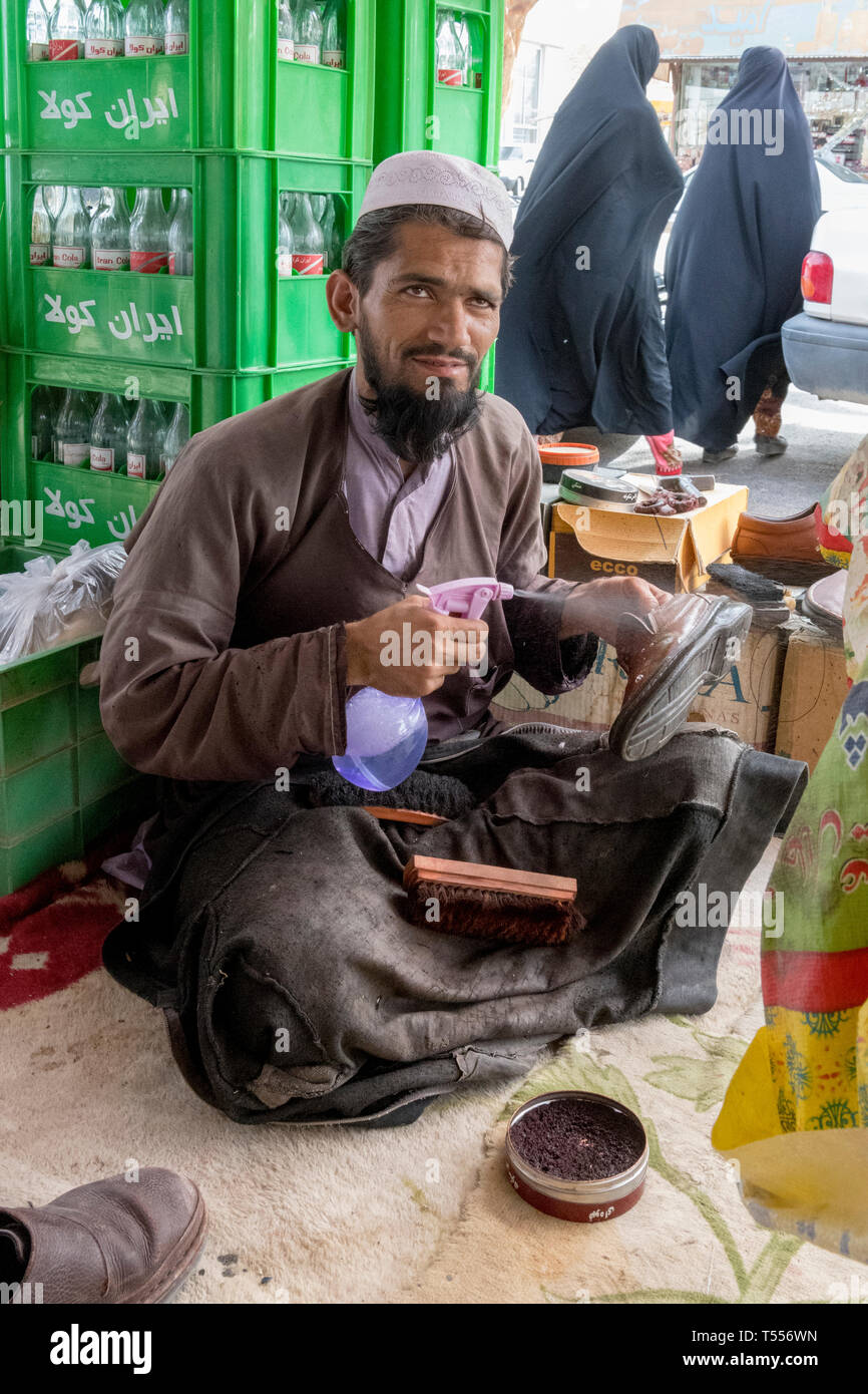 Shoe Cleaner At The Bazaar, Dust Mohammad near Zabol at the Afghan Border,  Sistan and Baluchistan, Iran Stock Photo - Alamy