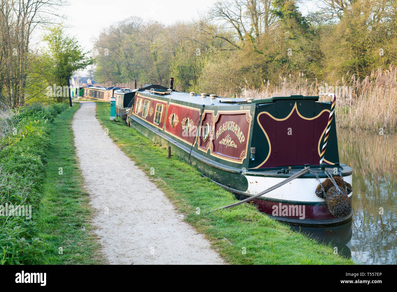 Canal boats on the oxford canal in the early morning spring sunlight