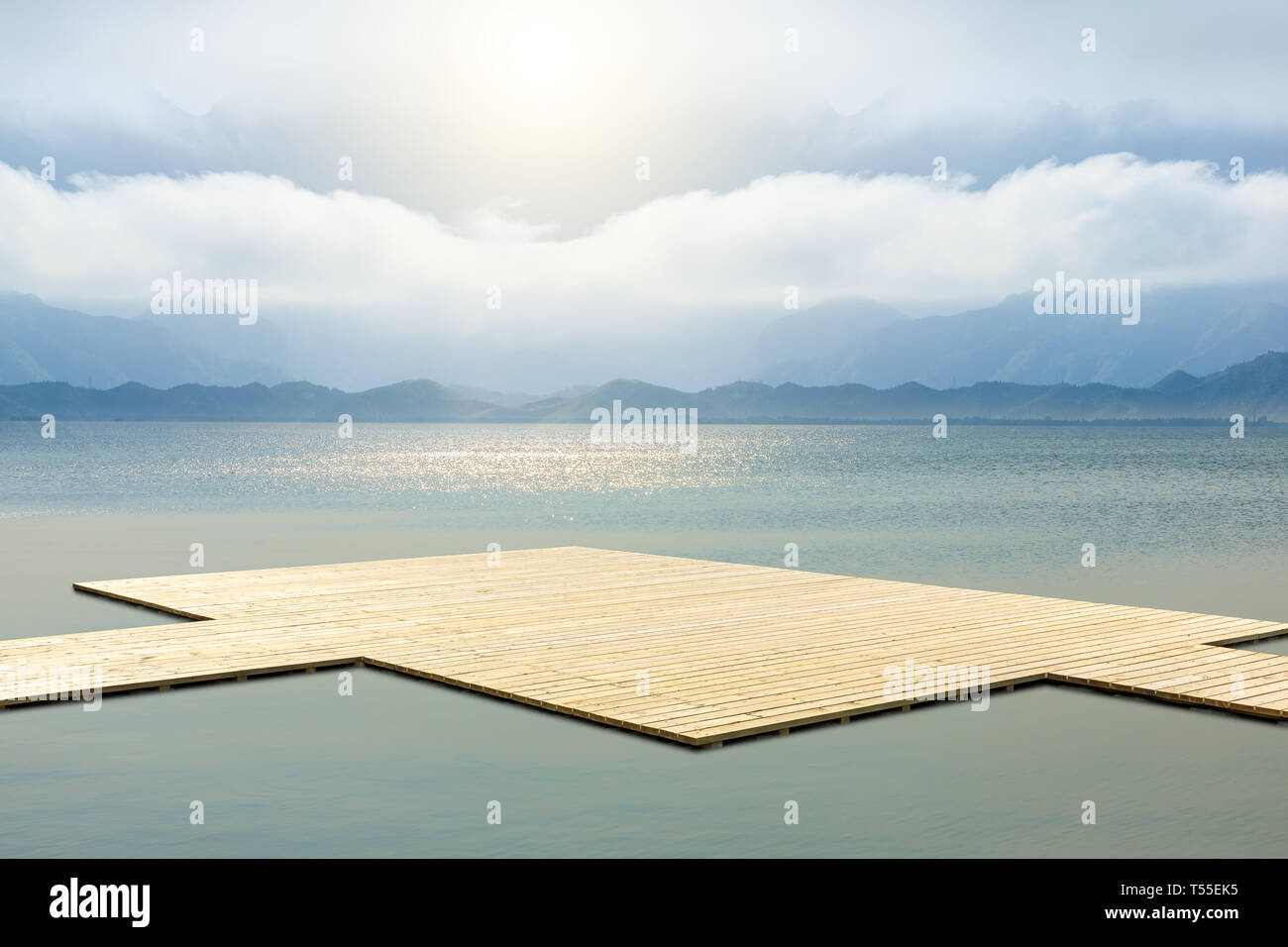 Wooden floor platform and lake with sky background Stock Photo