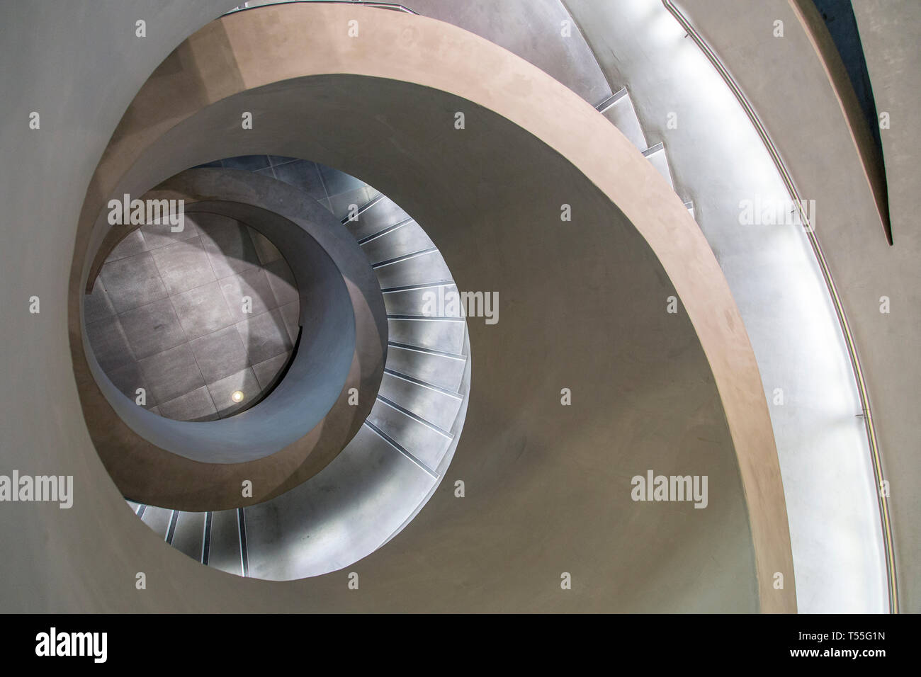 UAE, Abu Dhabi, Masdar City, Staircase detail in the Masdar PRT station of the Masdar Institute of Science and Technology designed by the architects F Stock Photo