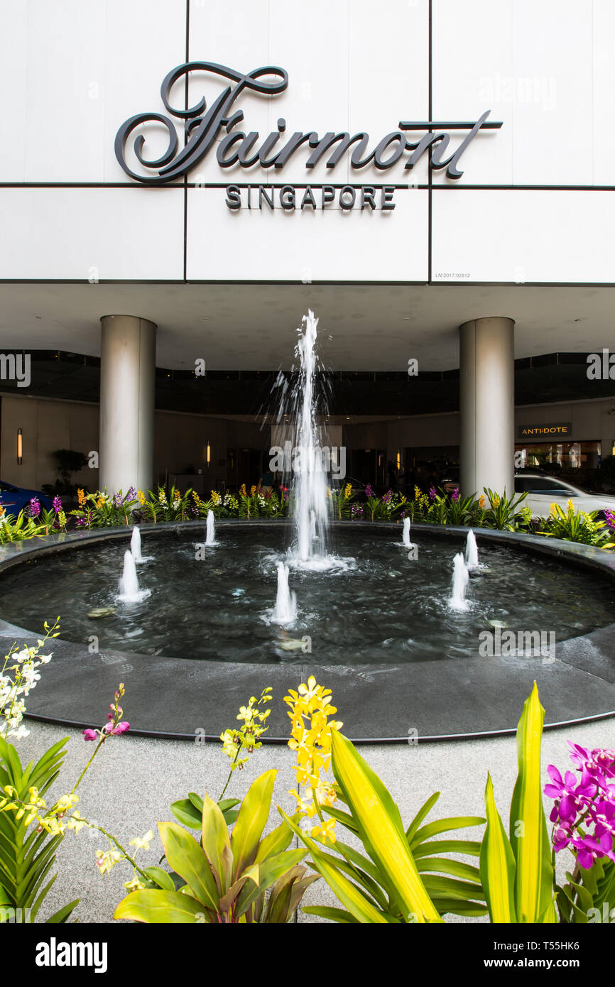 Outside of Fairmont Singapore Hotel entrance can see the beautiful