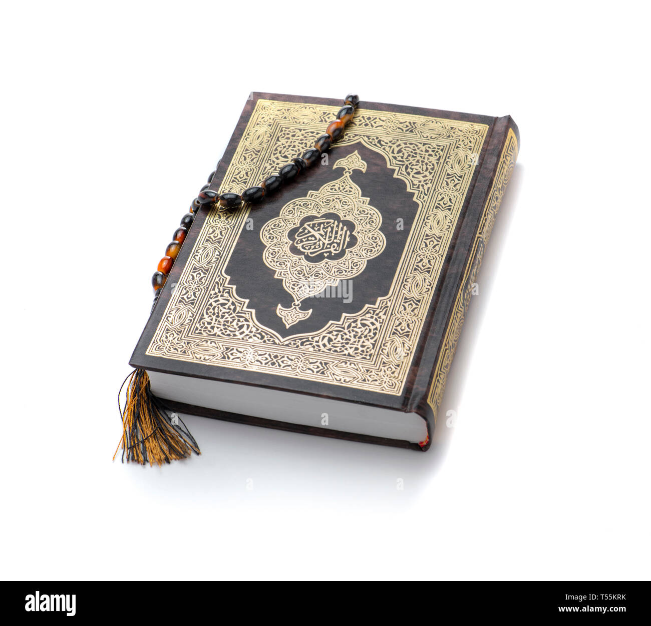 Quran Holy Book and Rosary Isolated on white Background Stock Photo