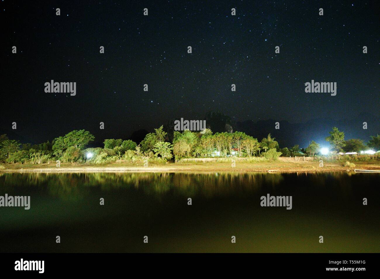Star Lit Sky Sky Fill Of Stars Over Serene Small River In Vangviag Province Laos Forest Riparian River Bank In The Night Peaceful Scene Of A Raw V Stock Photo Alamy