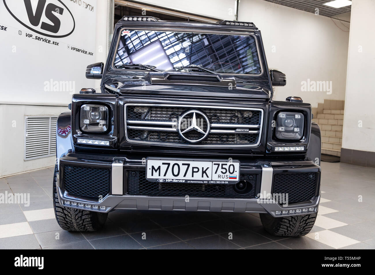 Novosibirsk, Russia - 08.01.18: Front view of luxury very expensive new  black Mercedes-Benz G-class 350d car with brabus tuning stands in the  washing Stock Photo - Alamy