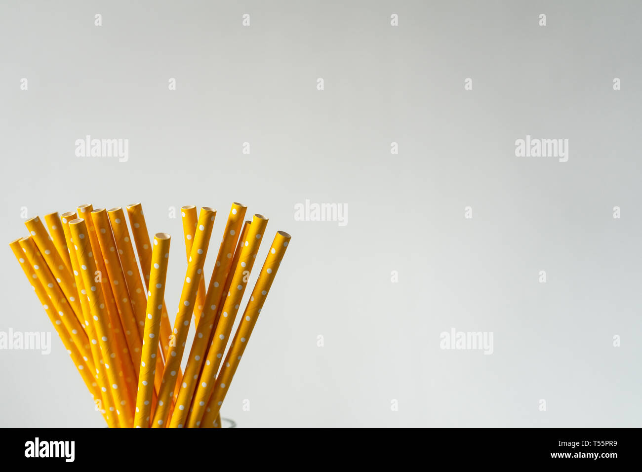Yellow paper straws isolated on white background Stock Photo Alamy