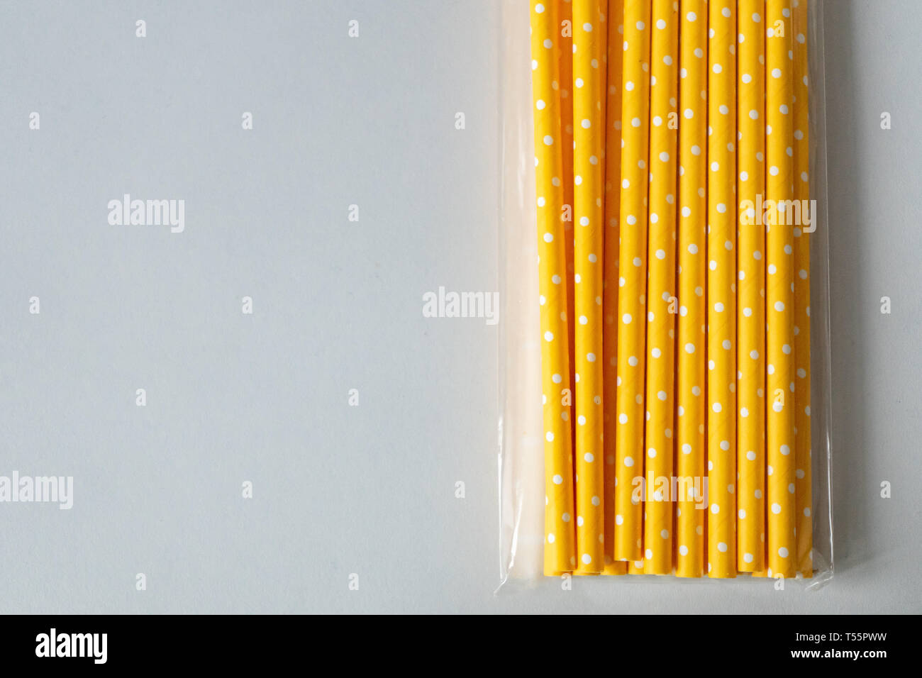 paper straws in plastic packaging isolated on white background Stock