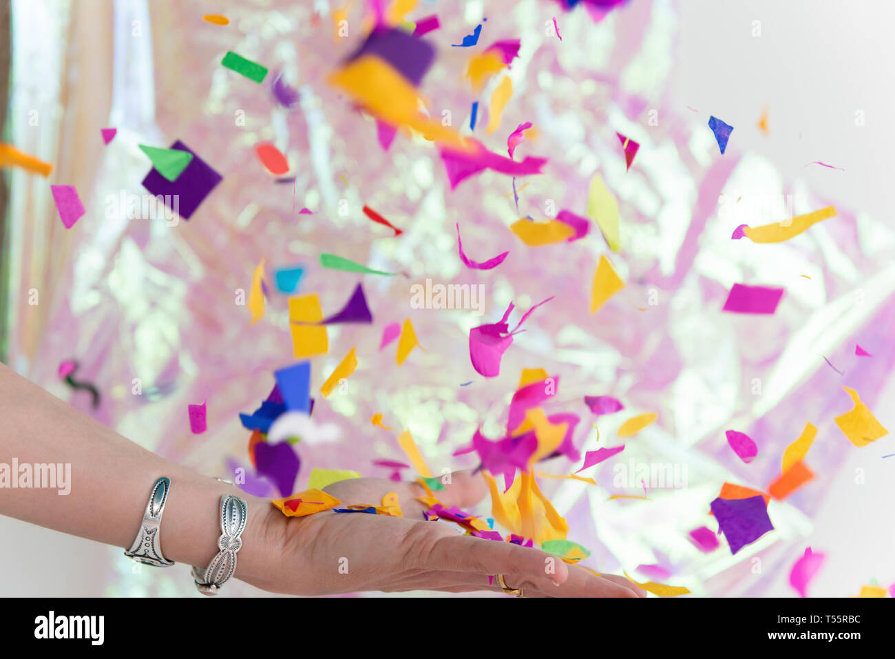 Hand Throwing Confetti High Resolution Stock Photography and Images Alamy