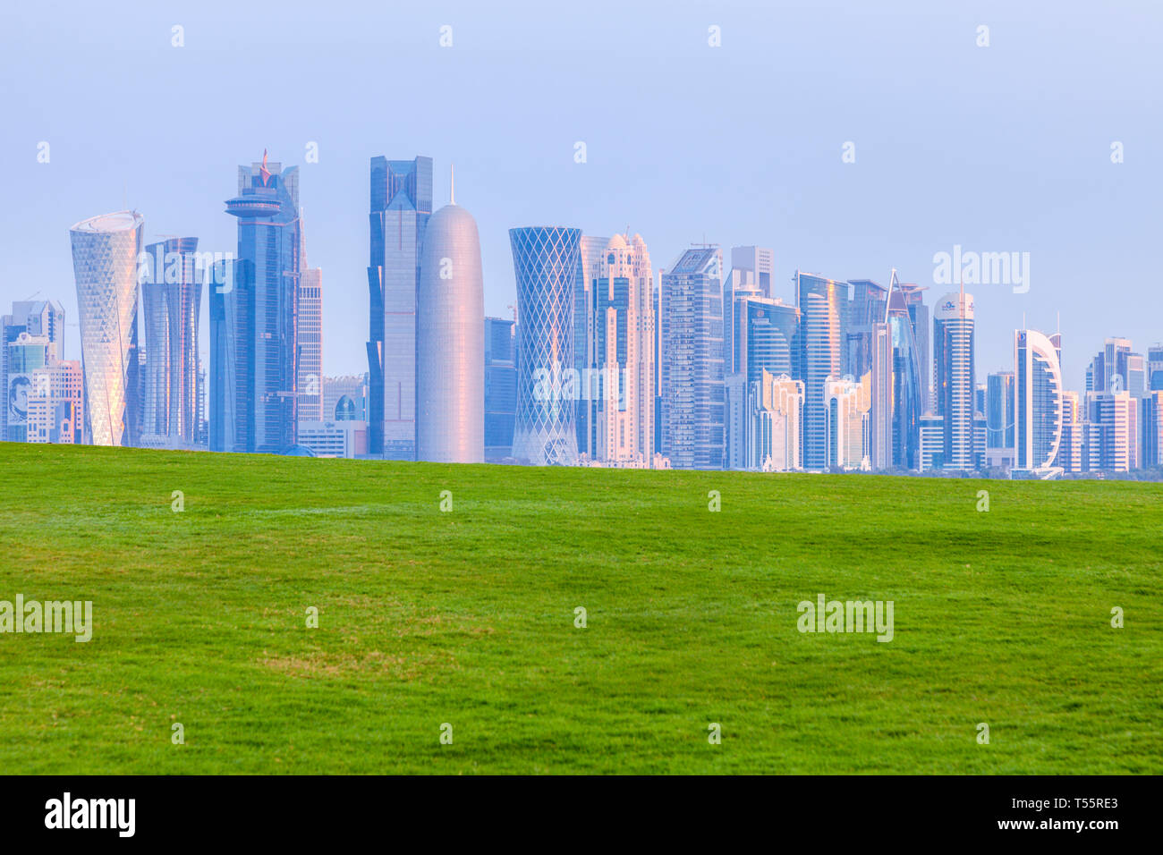 Lawn by skyline of Doha, Qatar Stock Photo