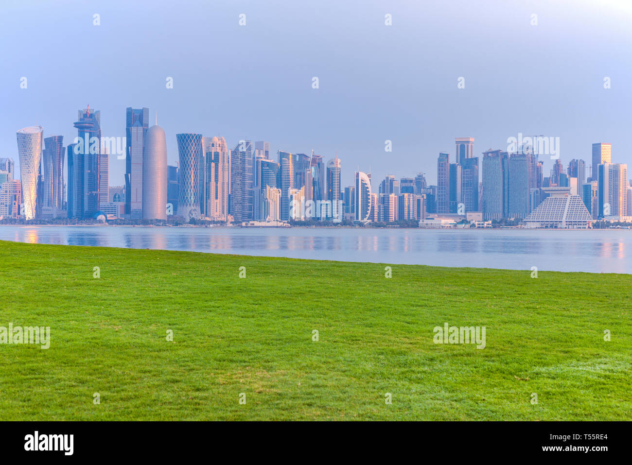 Lawn by skyline of Doha, Qatar Stock Photo