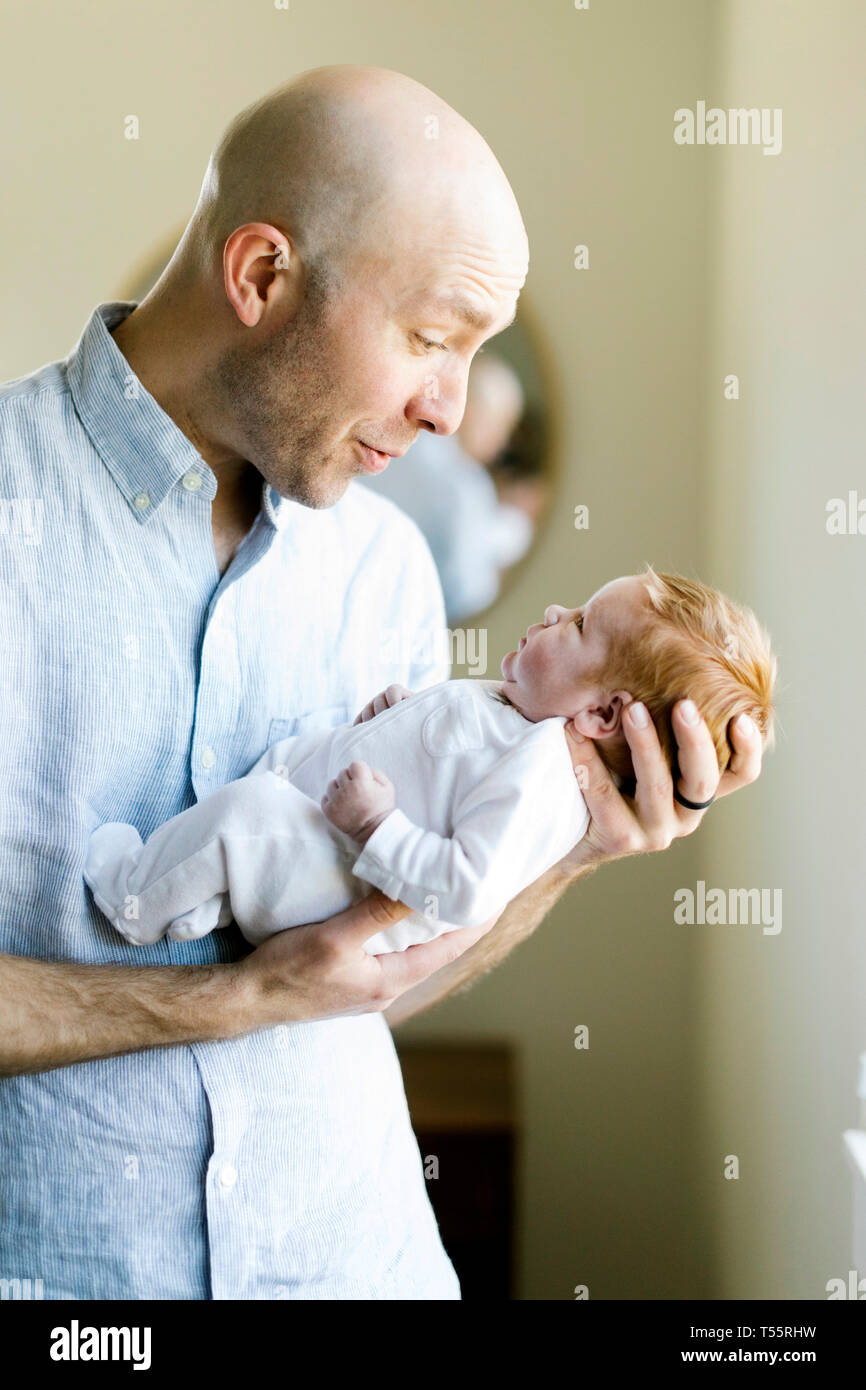 Man holding his baby son Stock Photo