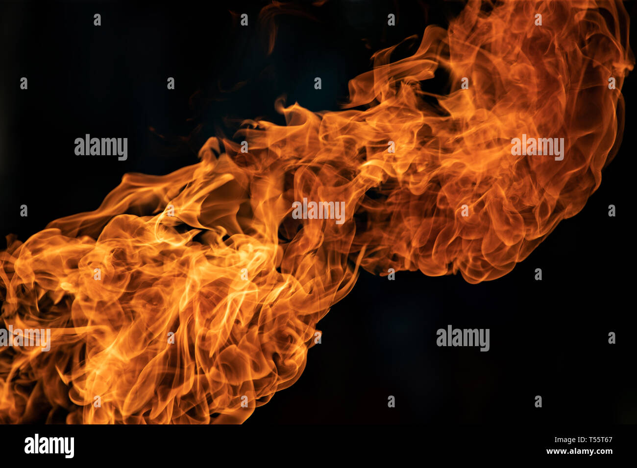 Closeup Fire flames from gas explosion on black background Stock Photo ...