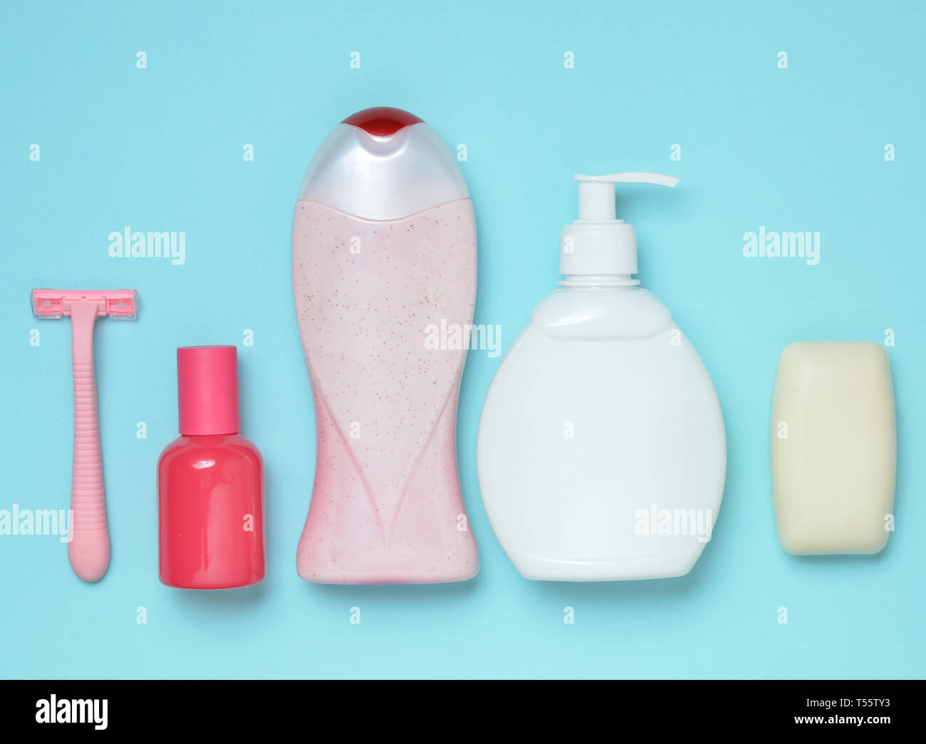 Products For The Care Of Body Hair And Personal Hygiene On A Blue