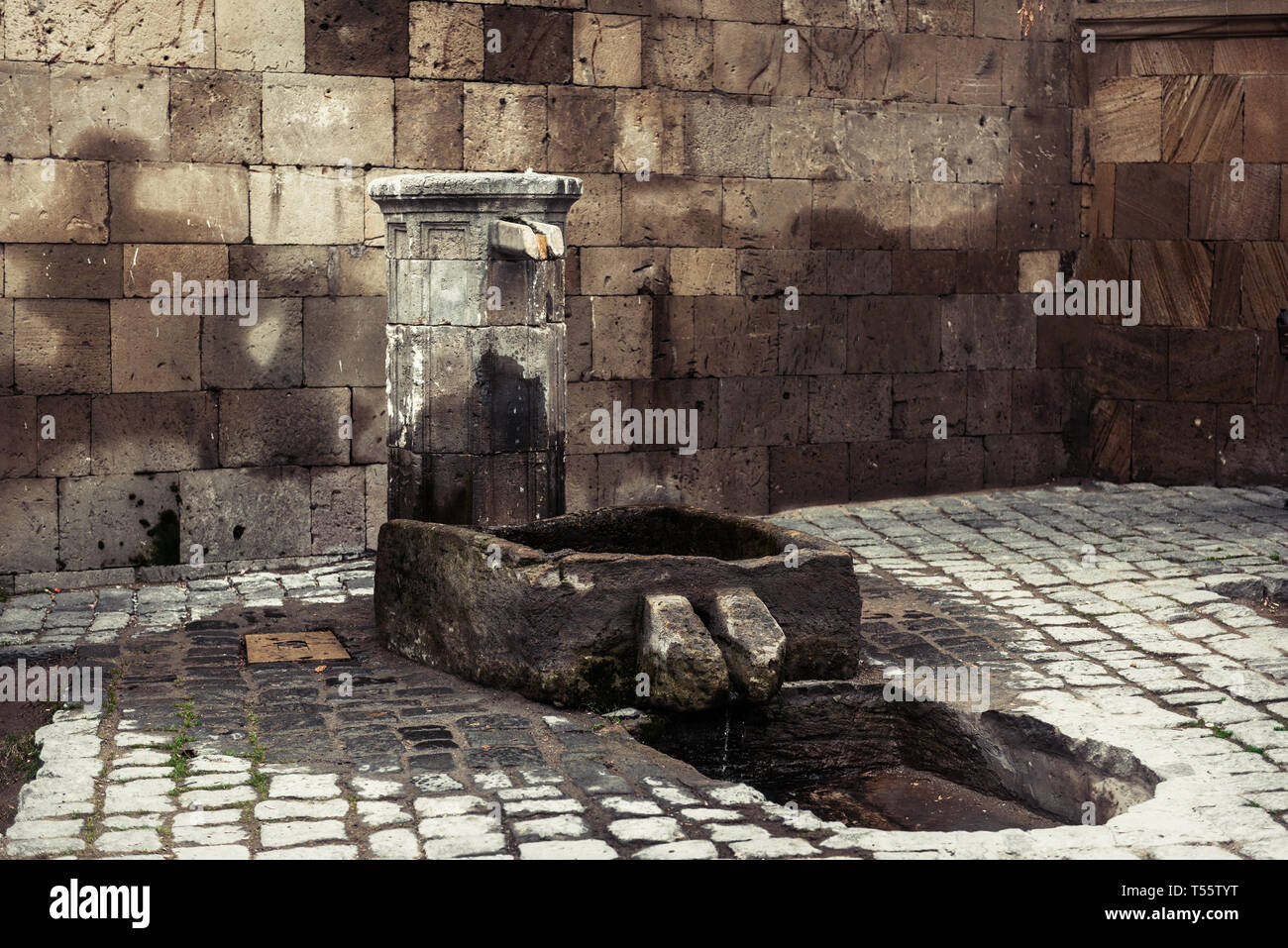 Ancient stone washbasin Stock Photo