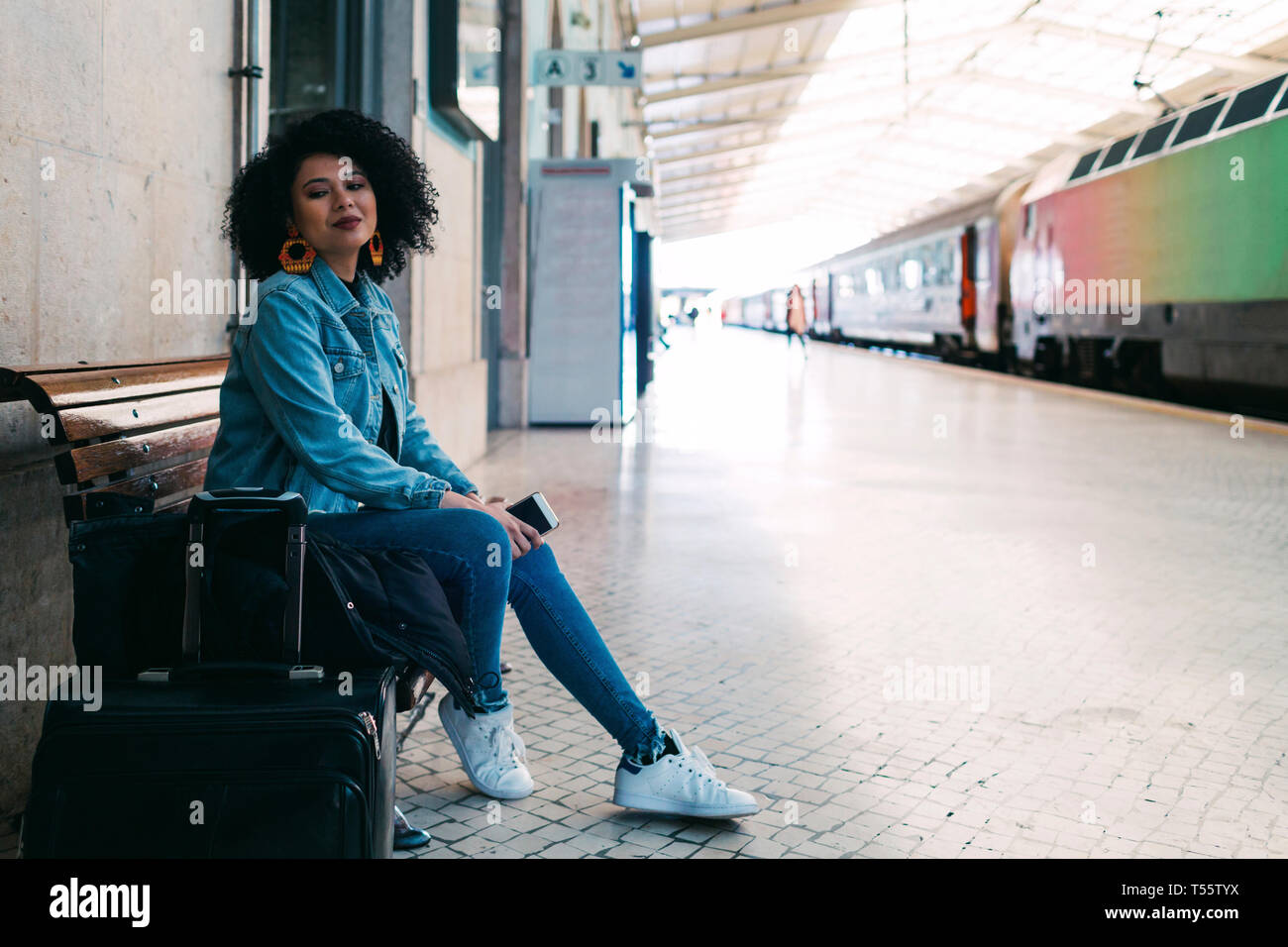 Black person train platform hi-res stock photography and images - Alamy