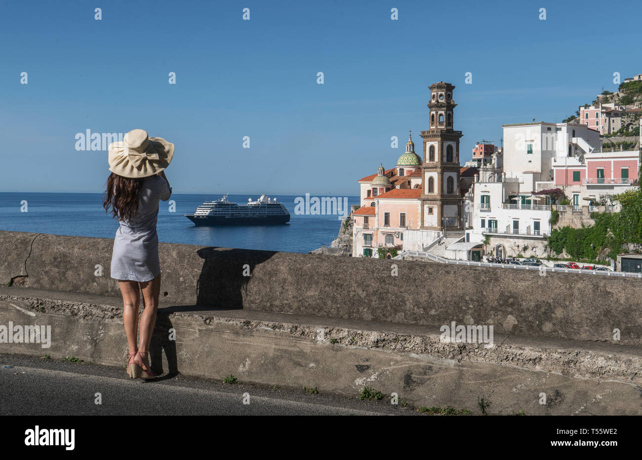 Woman wearing hat by Atrani, Italy Stock Photo