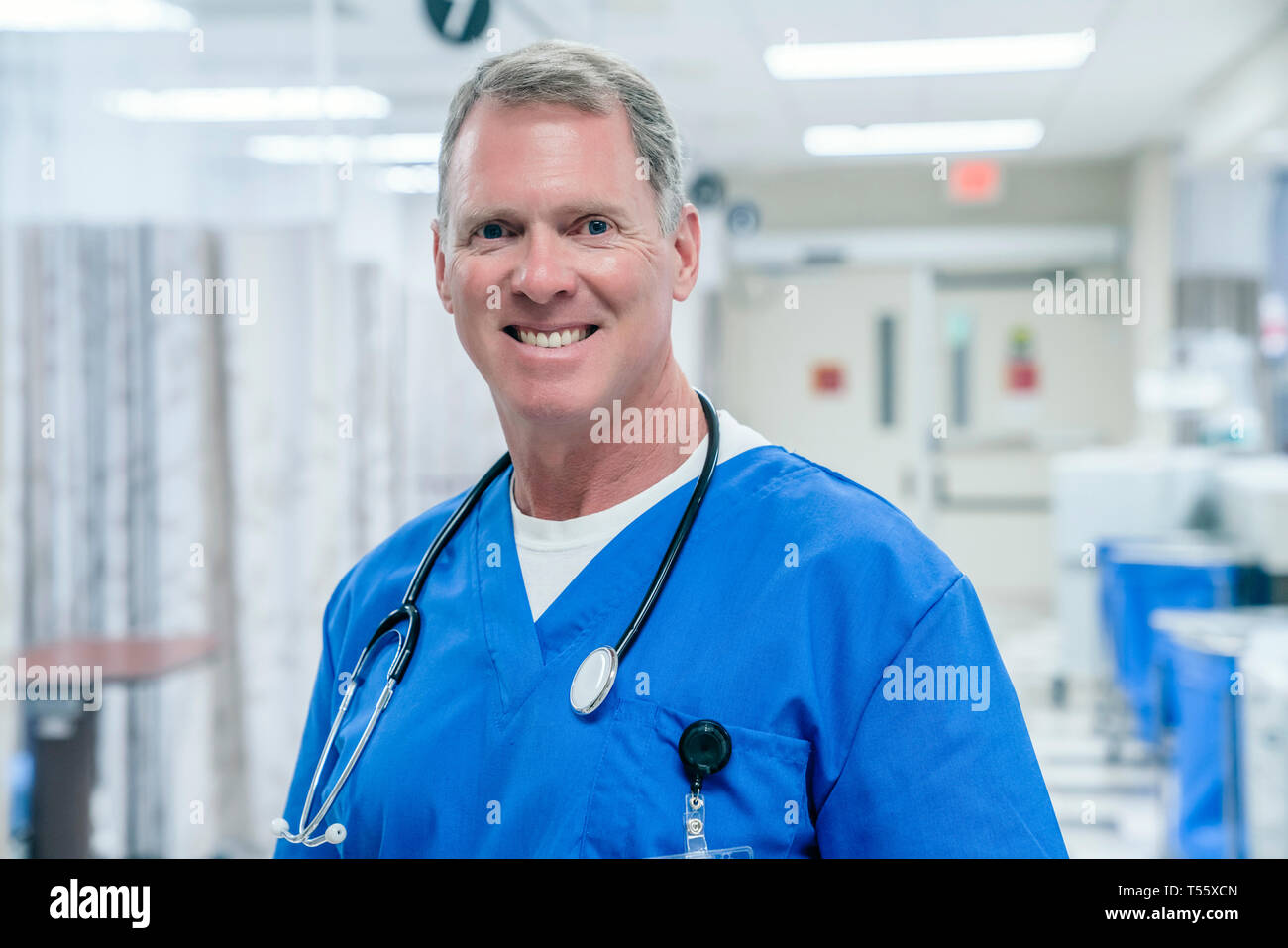 Portrait of smiling doctor with stethoscopes Stock Photo