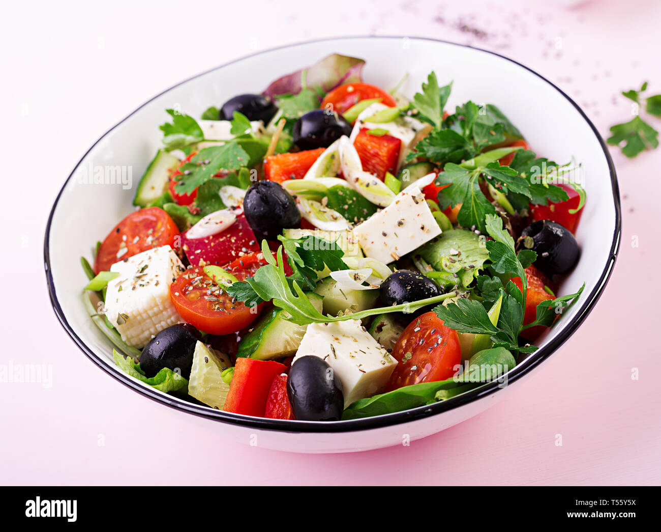 Greek Salad With Cucumber Tomato Sweet Pepper Lettuce Green Onion Feta Cheese And Olives With Olive Oil Healthy Food Stock Photo Alamy