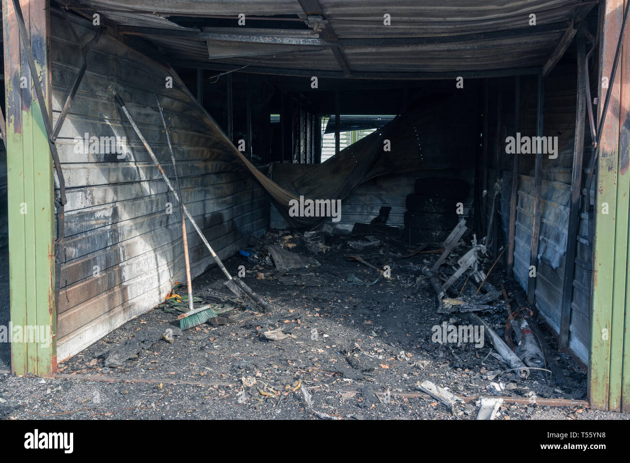 Small Car Garages In The Suburbs That Have Been Destroyed By A Big