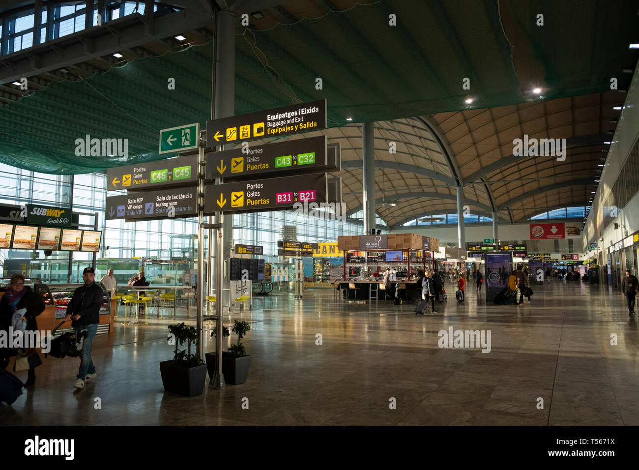 Alicante Airport Spain interior passenger departure hall with signs to gates Stock Photo