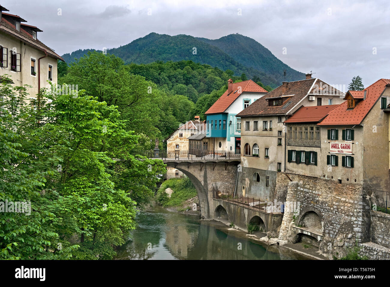 Škofja Loka is a town in Slovenia: The Capuchin bridge (Kapucinski most)  is the oldest preserved bridge in Slovenia. Stock Photo