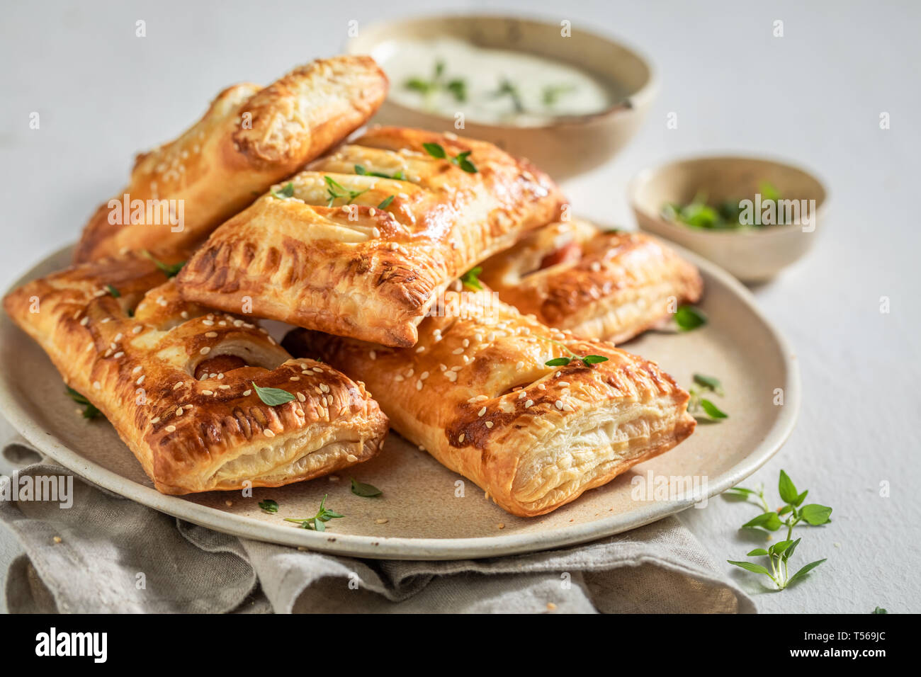 Crispy sausage roll with thyme and sesame seeds Stock Photo Alamy