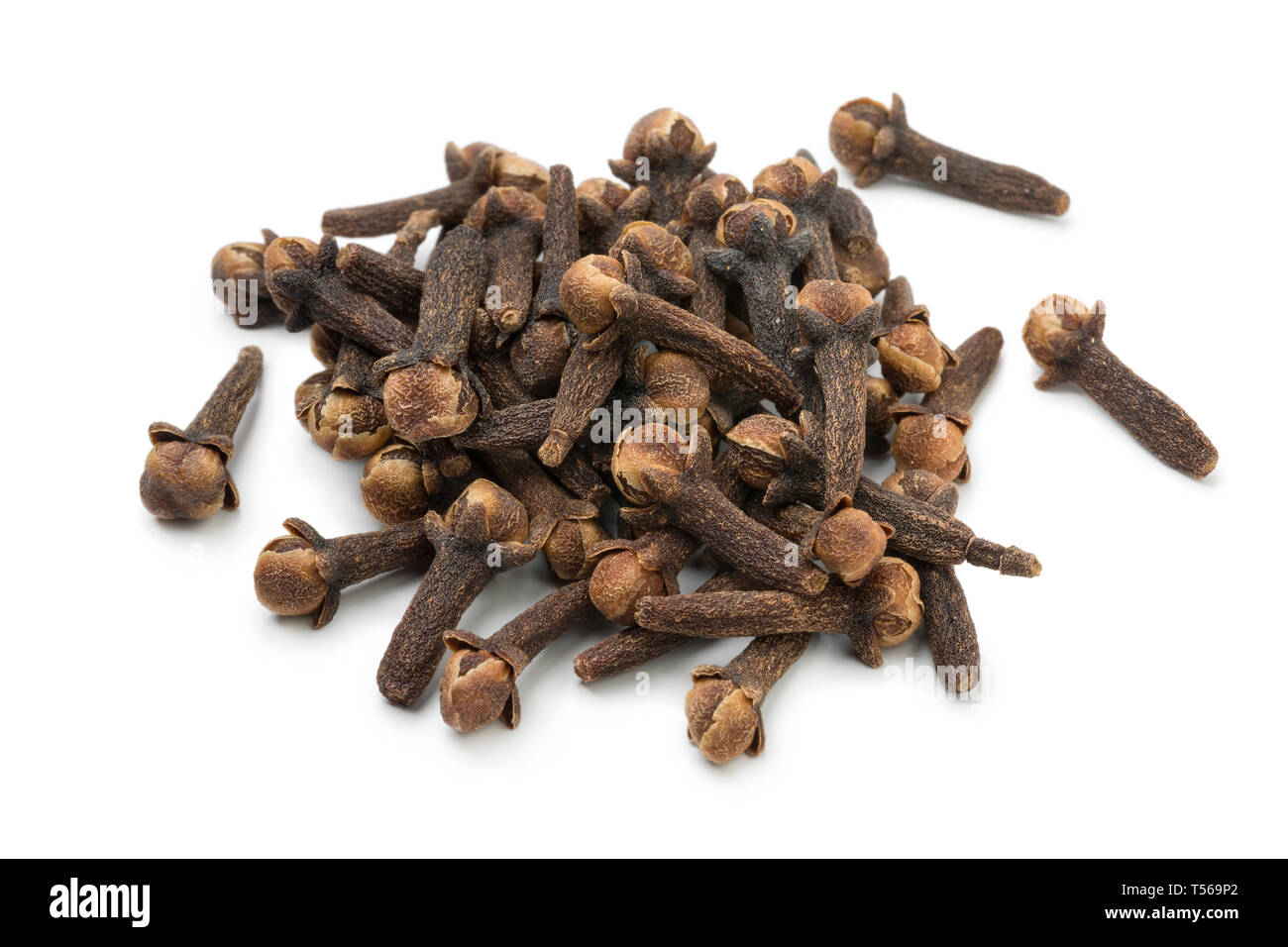 Heap of aromatic dried cloves isolated on white background Stock Photo